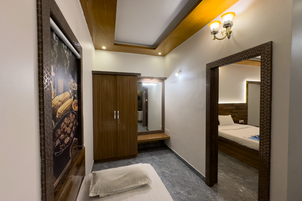 Private Cottage With Modern Amenities Near Ramanagara Suite room with cozy interiors and large windows offering tranquil views of nature near Ramanagara
