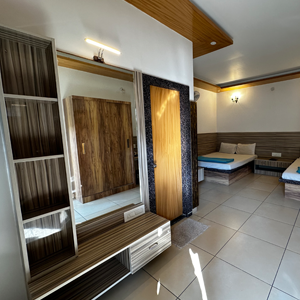 Spacious Cottage Suite Room With Modern Interiors in Bangalore Well-furnished resort with suite rooms and scenic greenery views with classy interiors